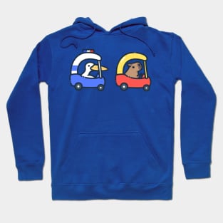 capybara and pelican car chase Hoodie